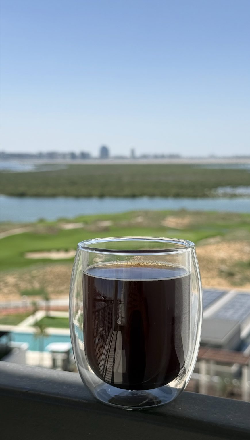Morning coffee over Yas Links